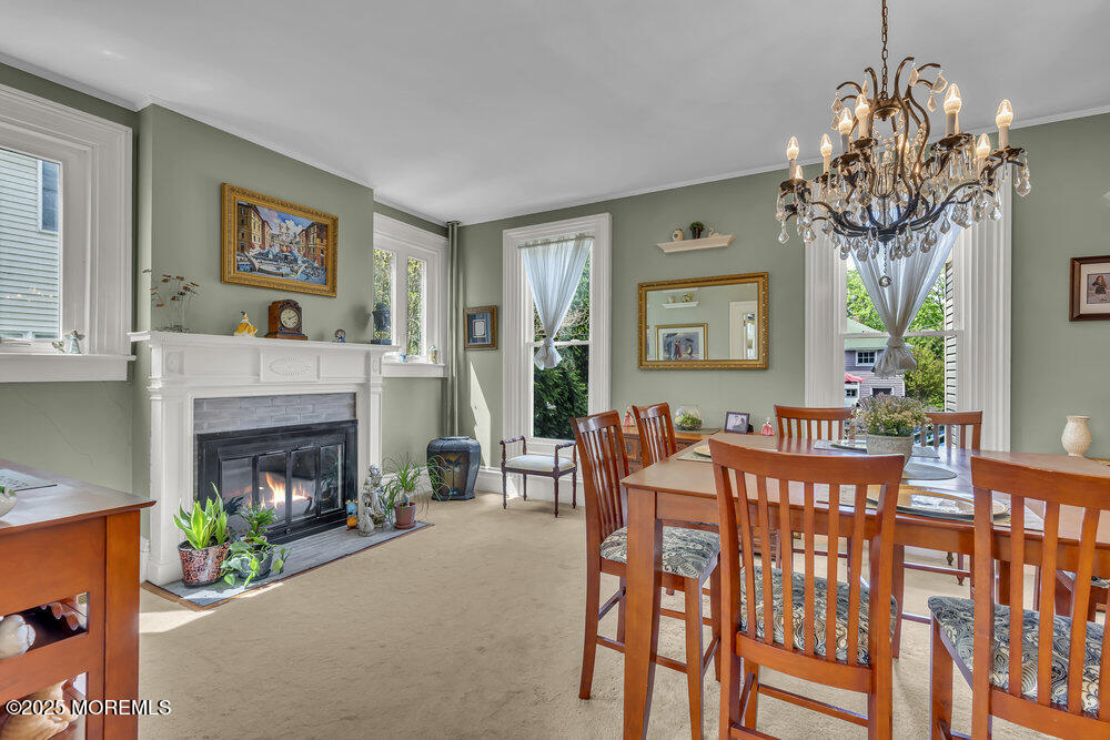 75 Elizabeth Street Keyport, NJ 07735 - Photo 14 of 61 a view of a dining room with furniture a chandelier and window