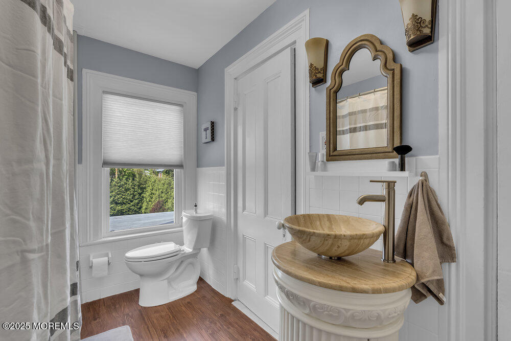 75 Elizabeth Street Keyport, NJ 07735 - Photo 31 of 61 a living room with furniture and a window