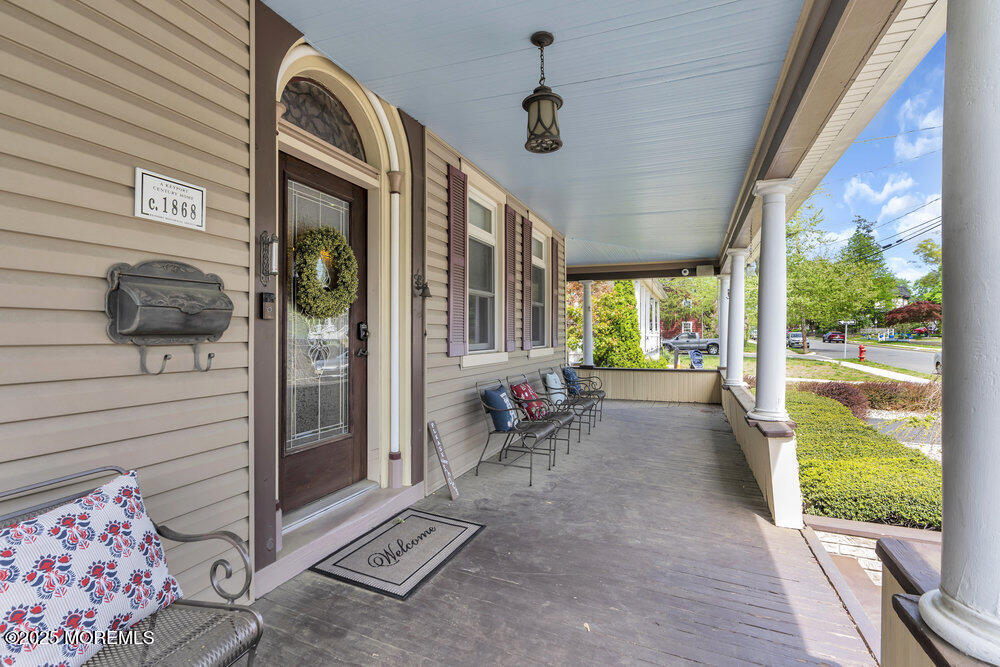 75 Elizabeth Street Keyport, NJ 07735 - Photo 4 of 61 a view of a porch with seating space