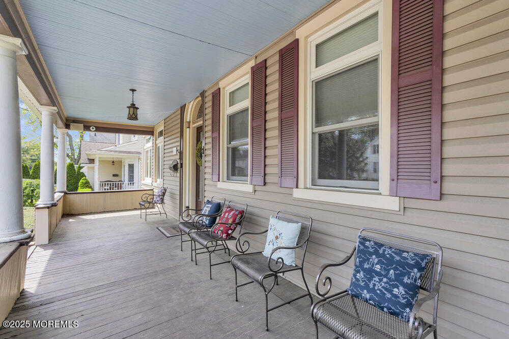 75 Elizabeth Street Keyport, NJ 07735 - Photo 5 of 61 a view of a porch with furniture