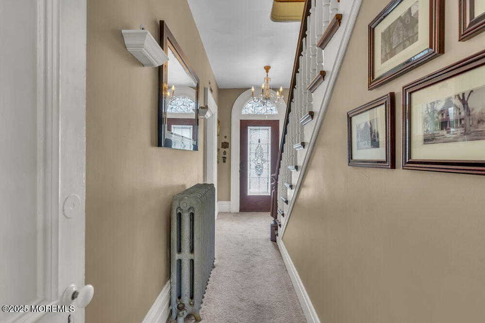 75 Elizabeth Street Keyport, NJ 07735 - Photo 8 of 61 a hallway with furniture and a entryway