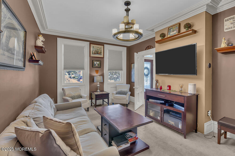 75 Elizabeth Street Keyport, NJ 07735 - Photo 10 of 61 a living room with furniture and a flat screen tv