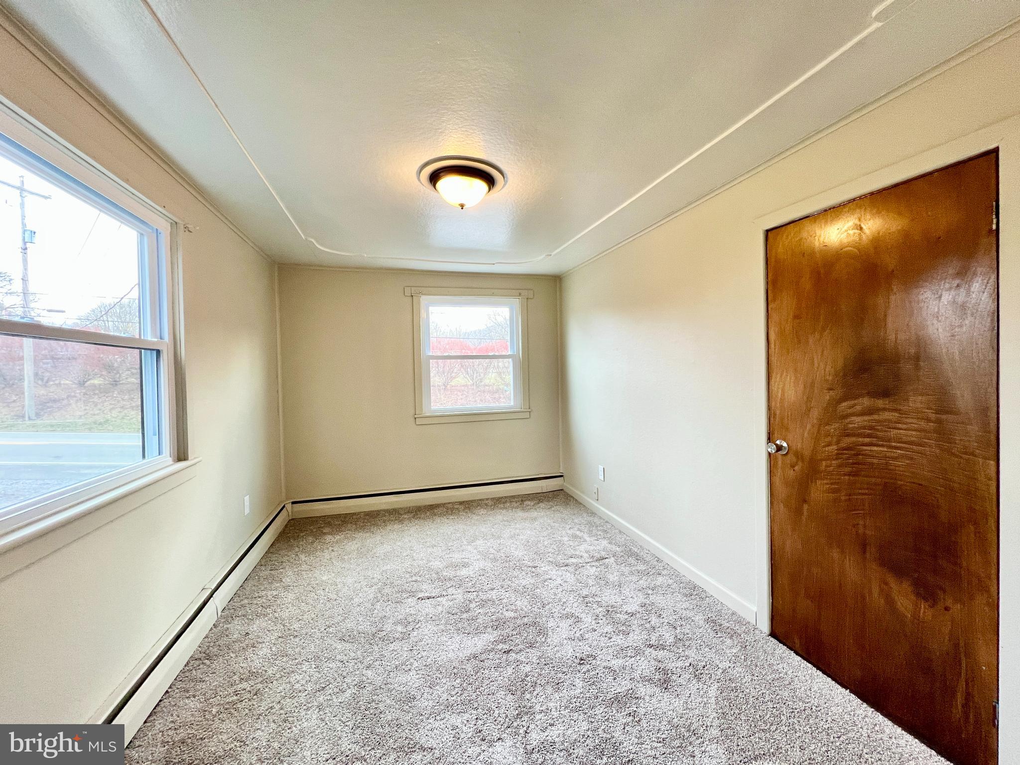 1722 Saxton Road Saxton, PA 16678 - Photo 17 of 24 an empty room with windows