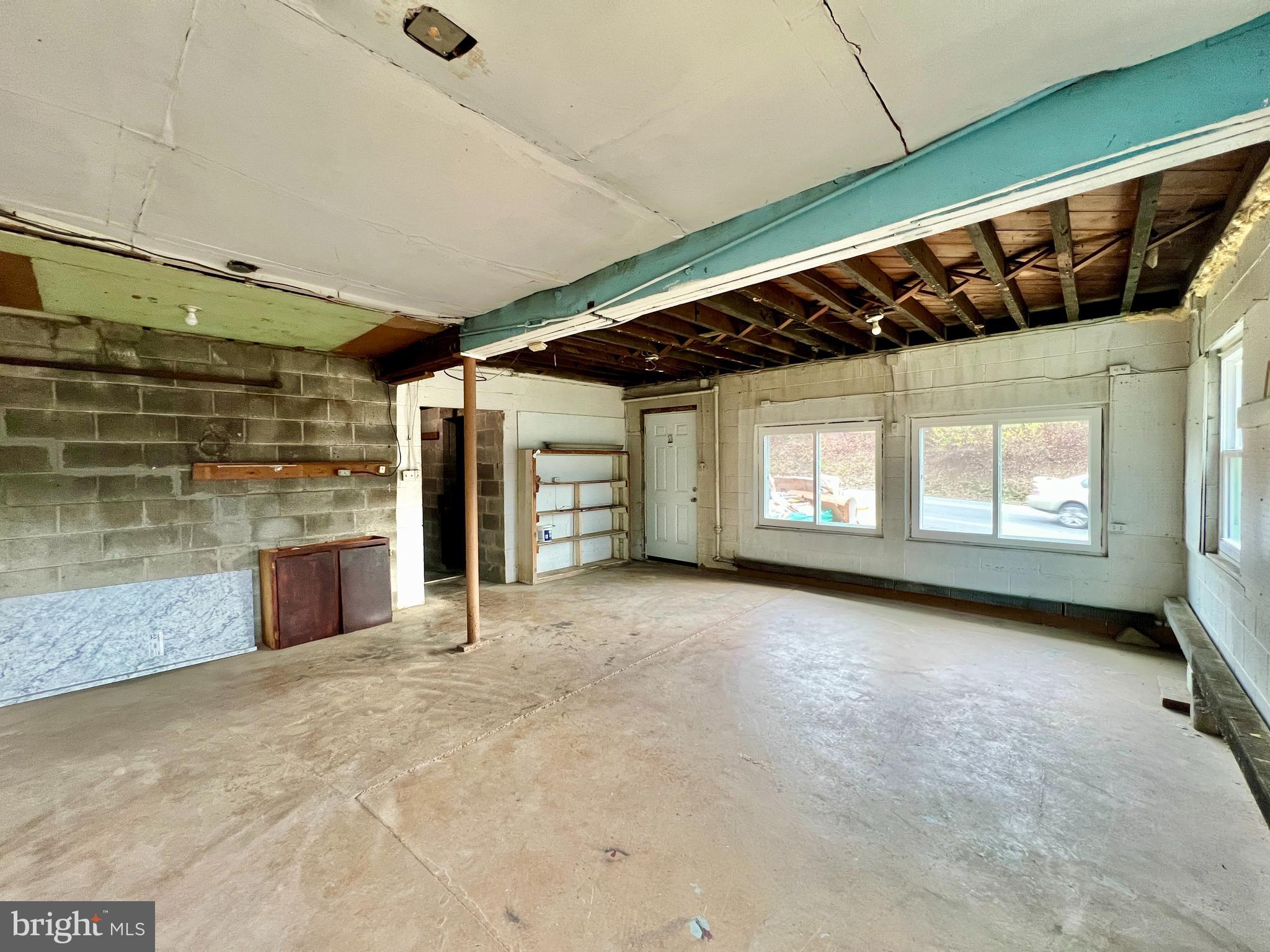 1722 Saxton Road Saxton, PA 16678 - Photo 21 of 24 an empty room with windows