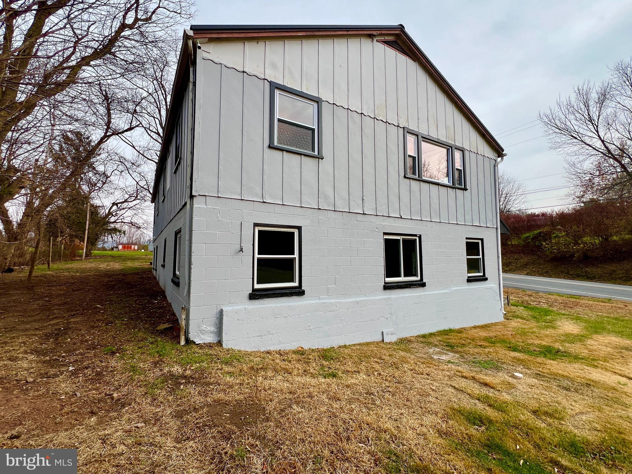 1722 Saxton Road Saxton, PA 16678 - Photo 5 of 24 a view of house with backyard and trees in the background