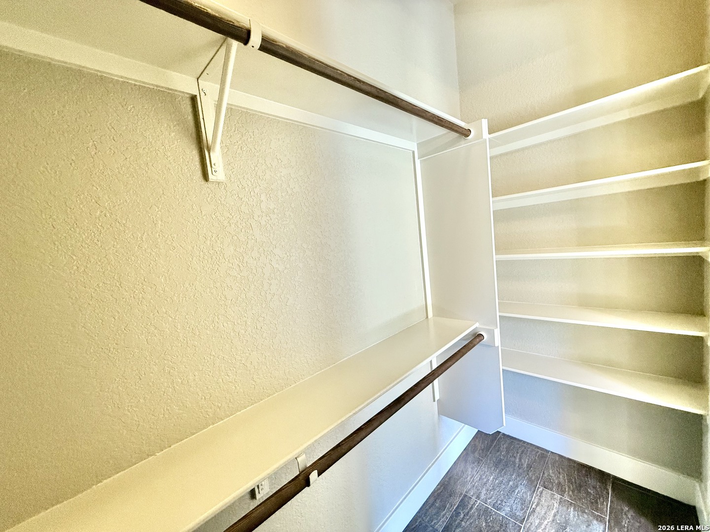 757 Copper Rim Spring Branch, TX 78070 - Photo 41 of 50 a view of walk in closet with empty racks