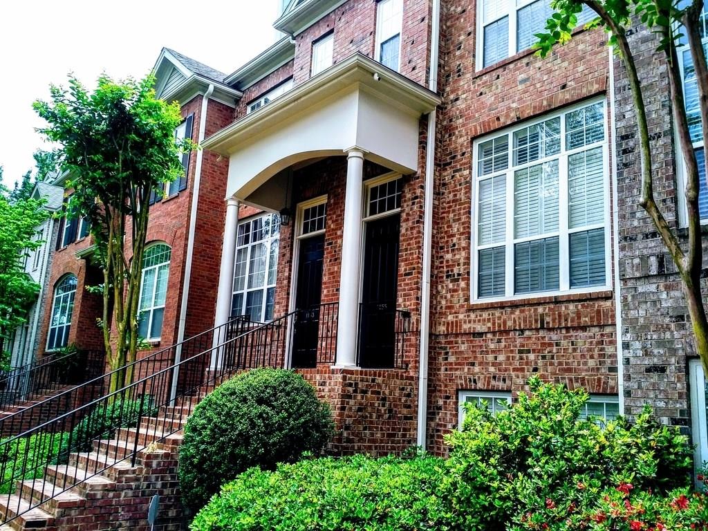 1155 Providence Place, Unit 1155 Decatur, GA 30033 - Photo 1 of 1 a front view of a house with a yard