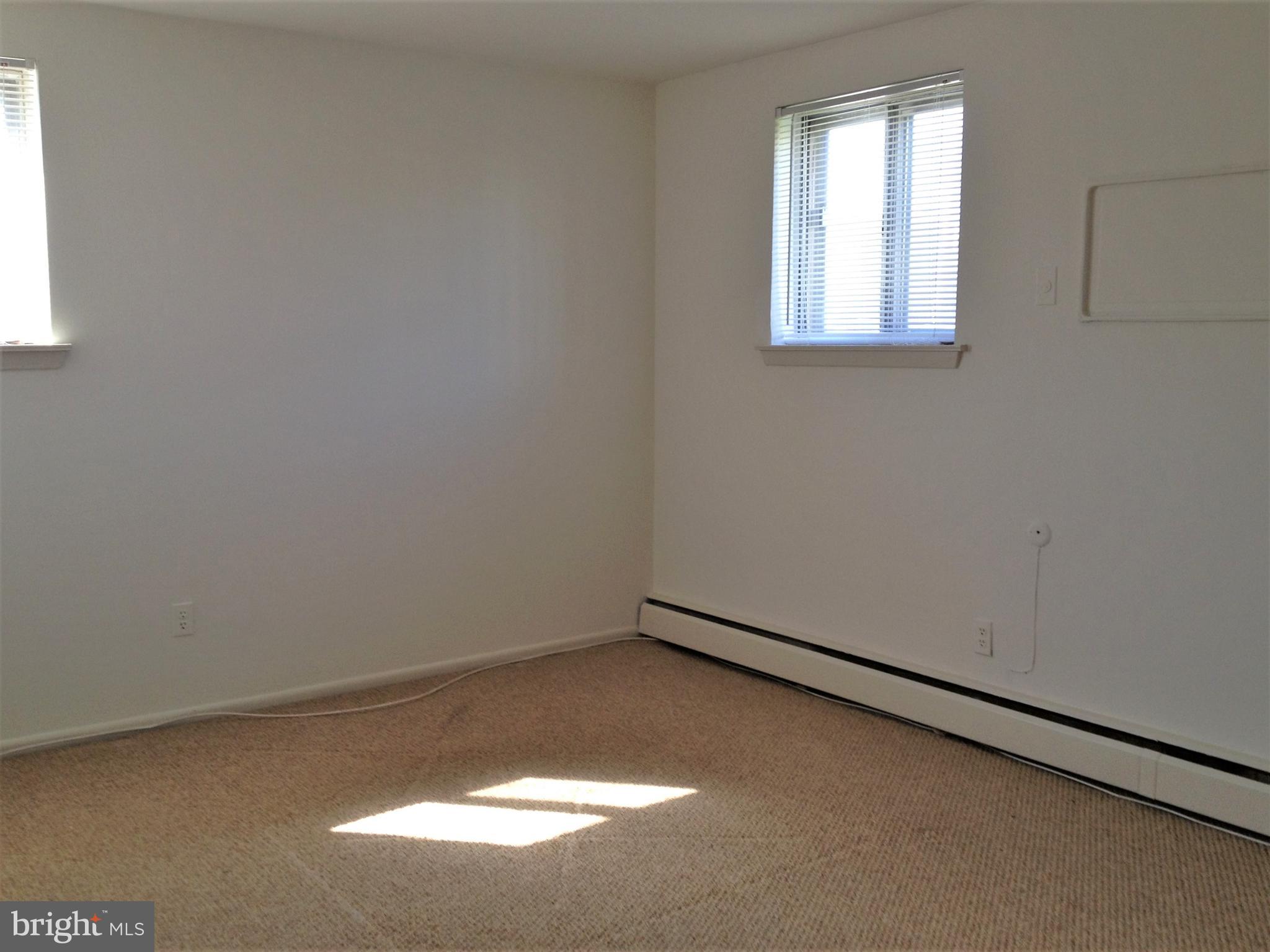 141 East 4th Avenue, Unit A1 Conshohocken, PA 19428 - Photo 10 of 10 an empty room with a window