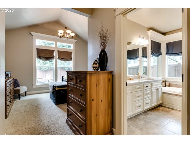 a kitchen with cabinets and window