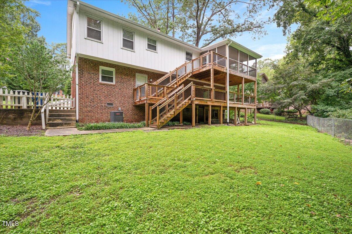 5812 Old Forge Circle Raleigh, NC 27609 - Photo 28 of 31 a view of a house with a yard and sitting area