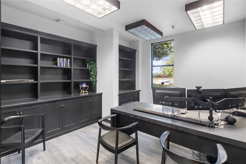 615 Clarion Court San Luis Obispo, CA 93401 - Photo 15 of 39 a room with a table chairs and wooden floor