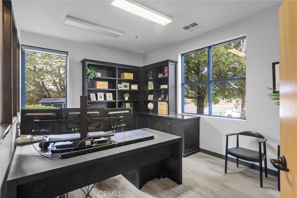 615 Clarion Court San Luis Obispo, CA 93401 - Photo 16 of 39 a work room with furniture and large windows