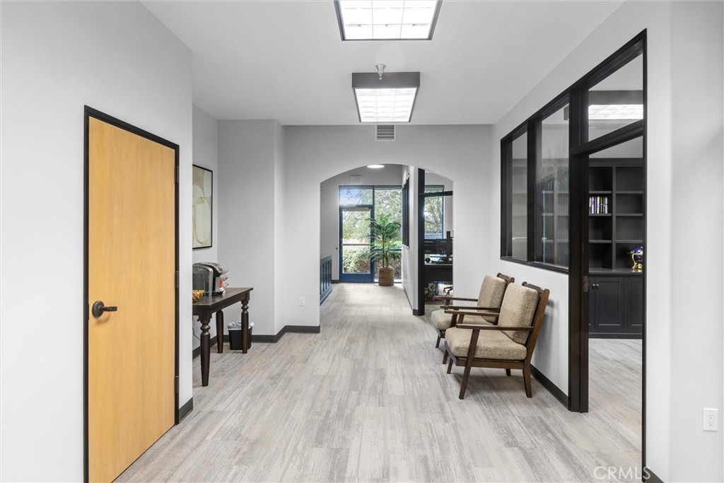 615 Clarion Court San Luis Obispo, CA 93401 - Photo 17 of 39 a living room with furniture and a wooden floor