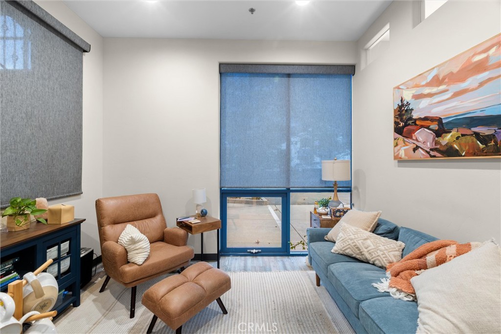 615 Clarion Court San Luis Obispo, CA 93401 - Photo 24 of 39 a living room with furniture and a couch