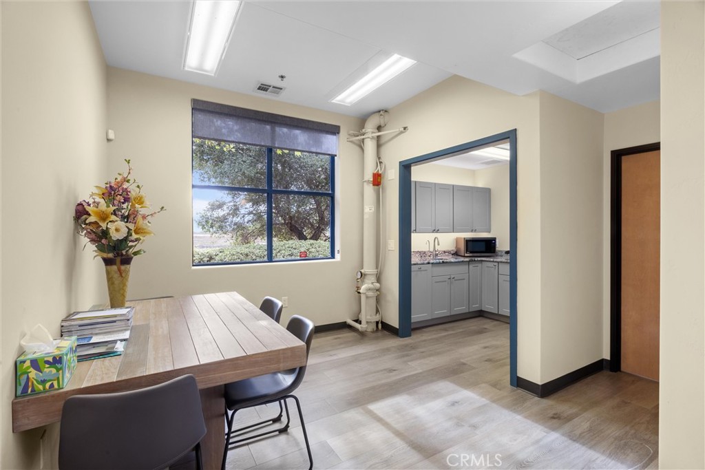 615 Clarion Court San Luis Obispo, CA 93401 - Photo 27 of 39 a living room with furniture and a window