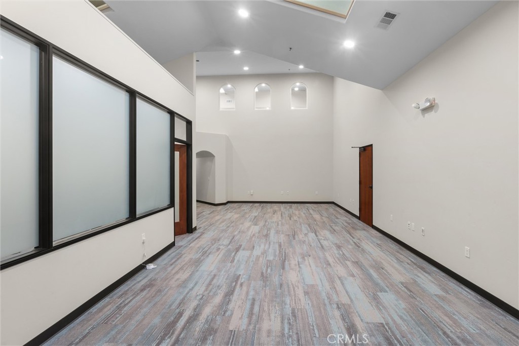 615 Clarion Court San Luis Obispo, CA 93401 - Photo 28 of 39 a view of a hallway with wooden floor