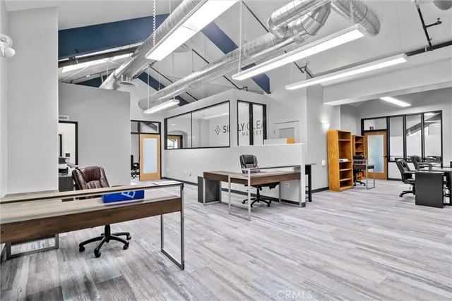 a bathroom with a sink toilet and mirror