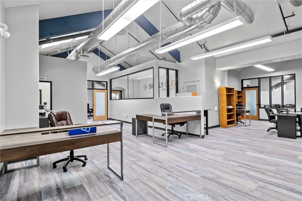 615 Clarion Court San Luis Obispo, CA 93401 - Photo 32 of 39 a living room with furniture and a wooden floor