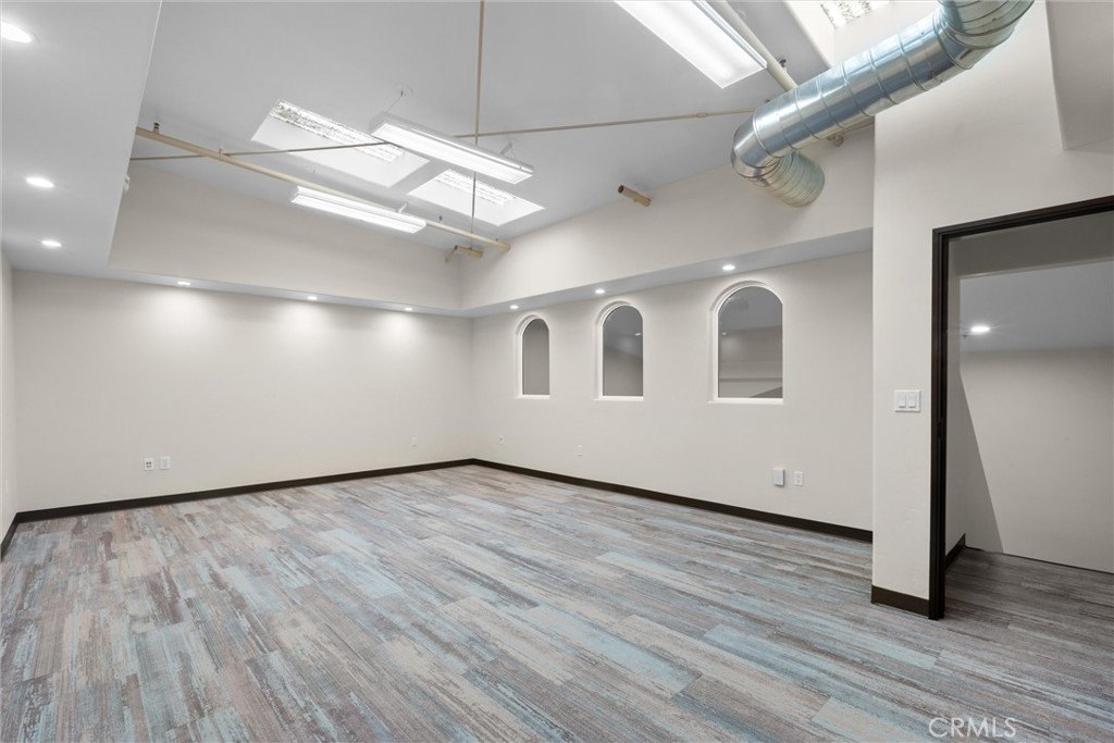 615 Clarion Court San Luis Obispo, CA 93401 - Photo 36 of 39 a view of an empty room with wooden floor