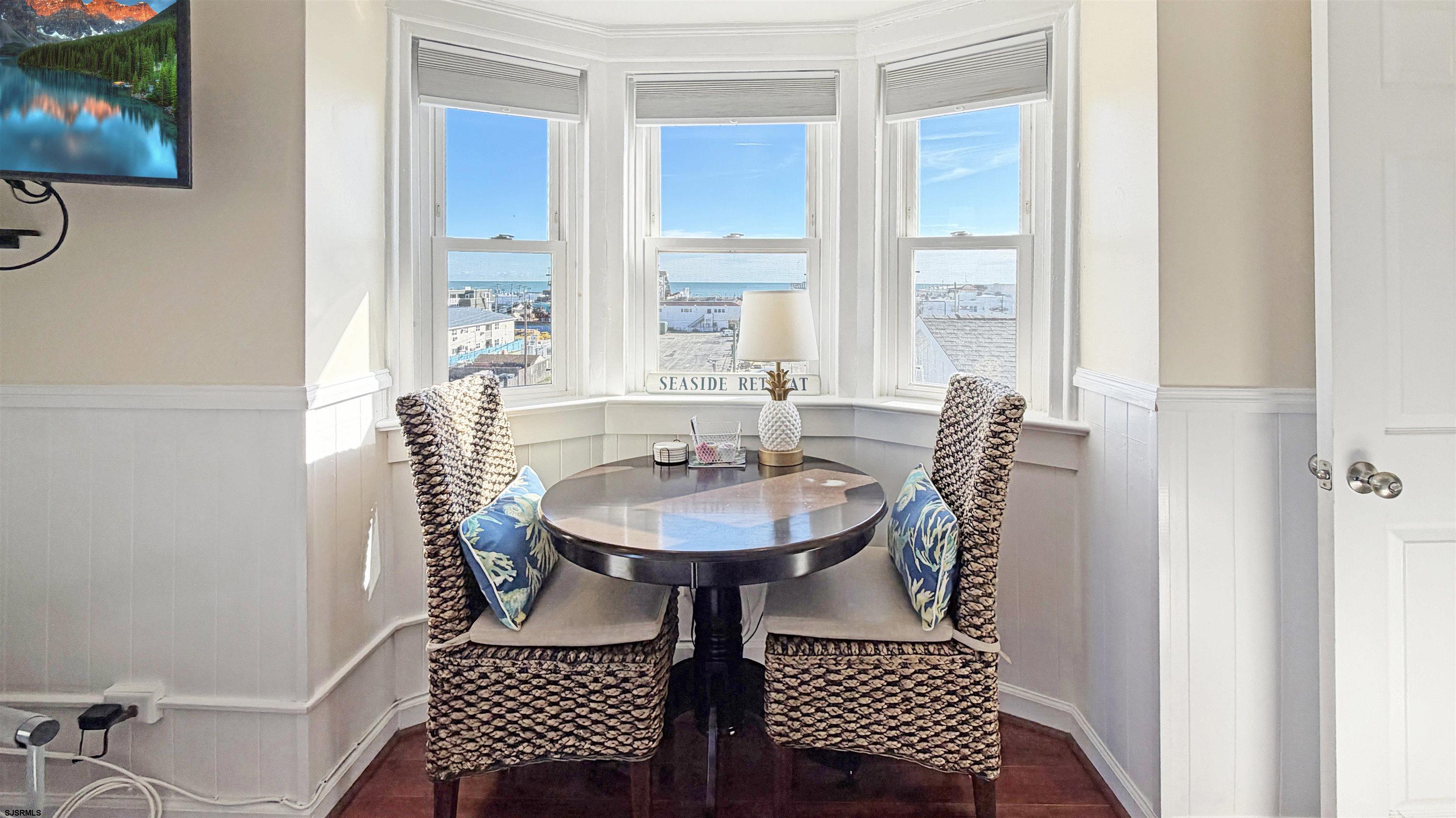 807 East 8th Street, Unit 511 Ocean City, NJ 08226 - Photo 6 of 12 a view of a bedroom with furniture and window