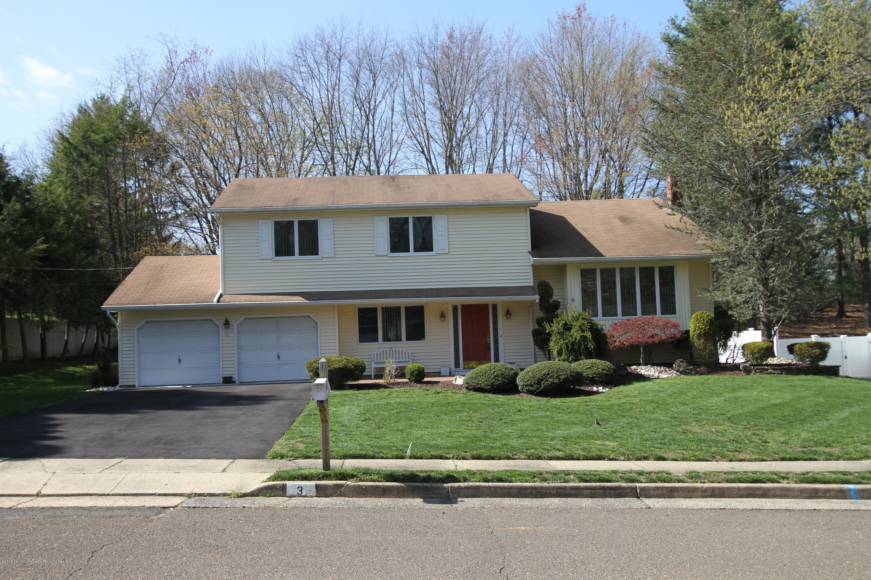 3 Floyd Wyckoff Road Morganville, NJ 07751 - Photo 1 of 28 a view of a house with a yard and large trees