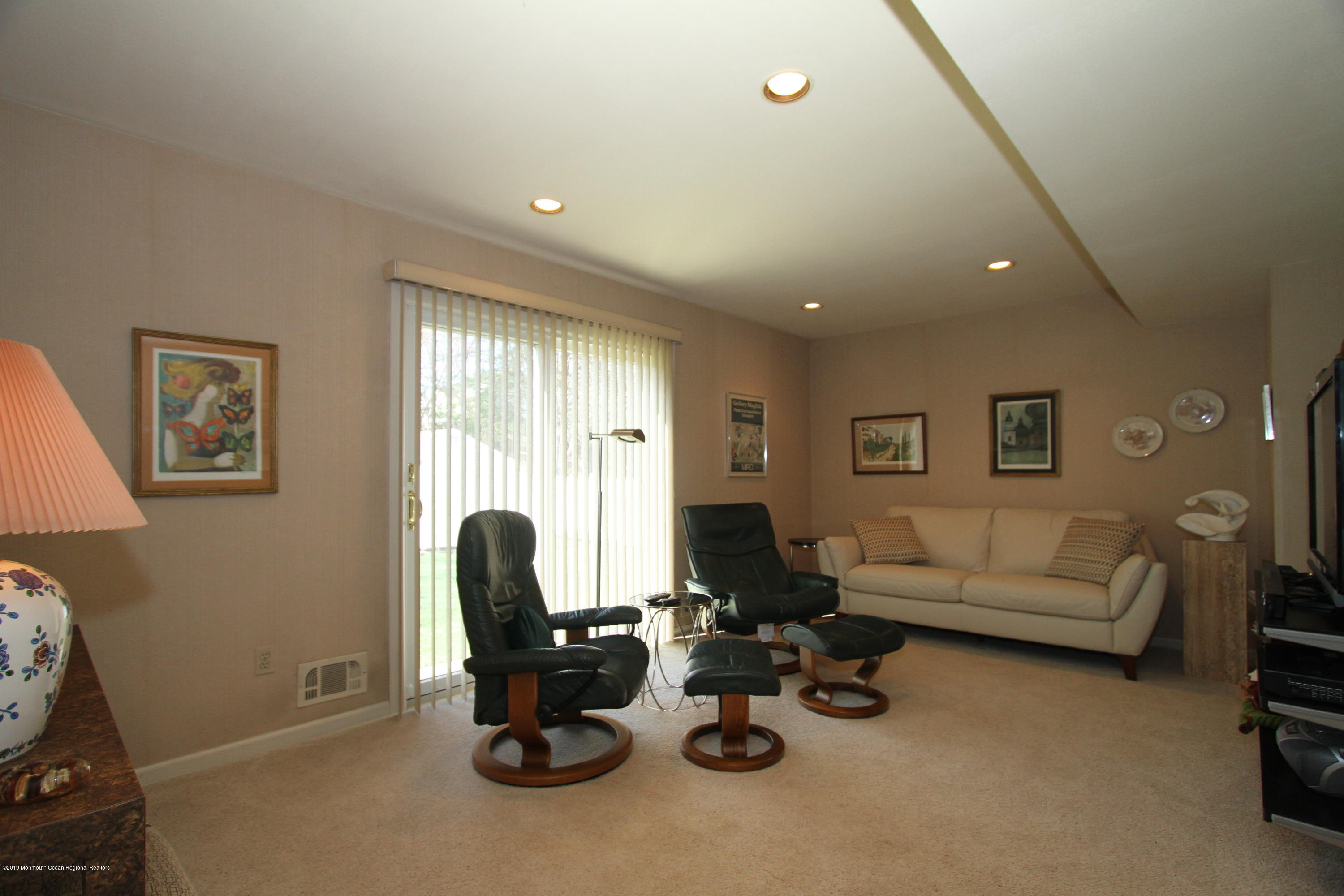 3 Floyd Wyckoff Road Morganville, NJ 07751 - Photo 18 of 28 a living room with furniture and a window