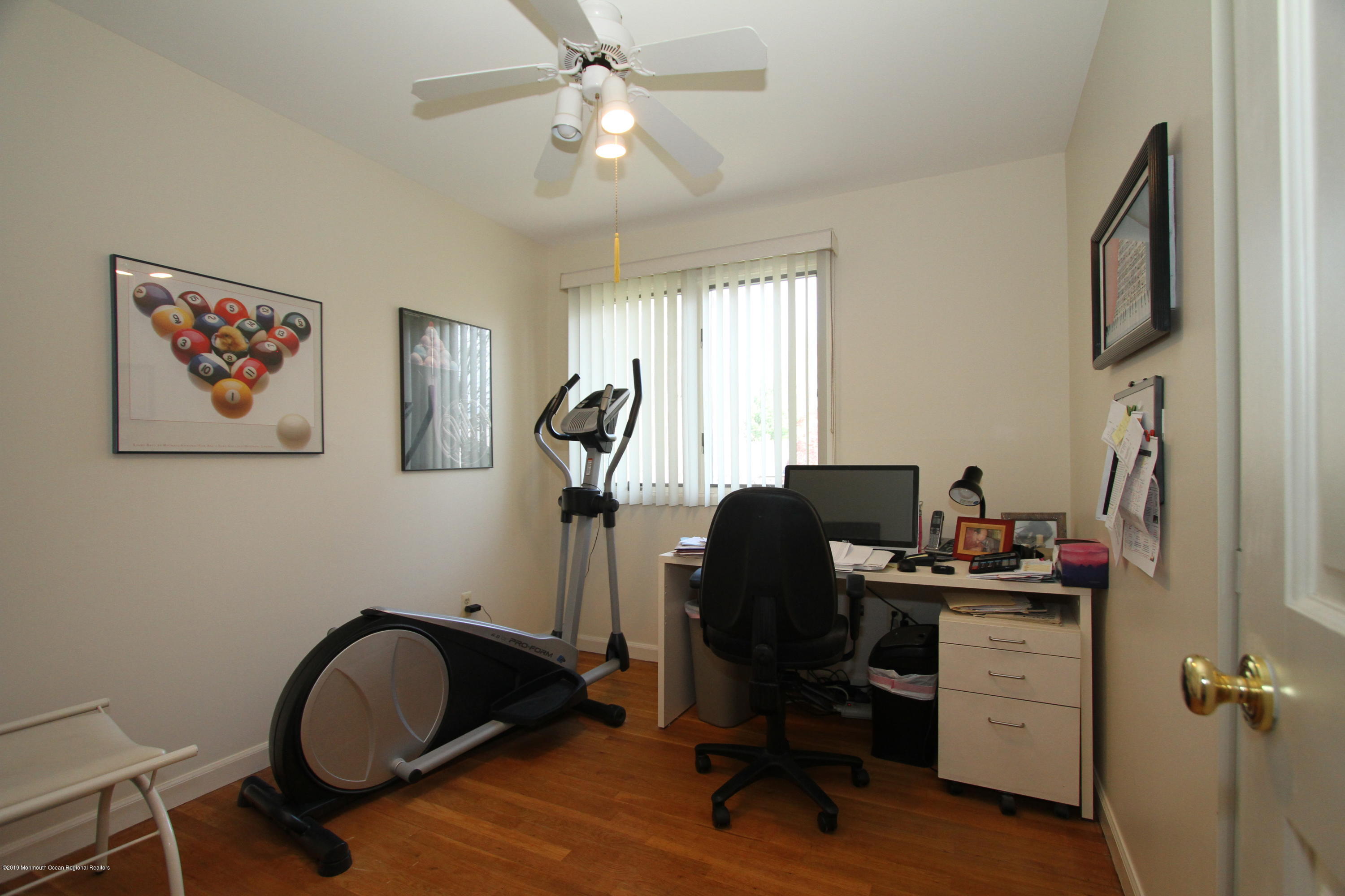 3 Floyd Wyckoff Road Morganville, NJ 07751 - Photo 20 of 28 a view of a workspace with furniture and a window