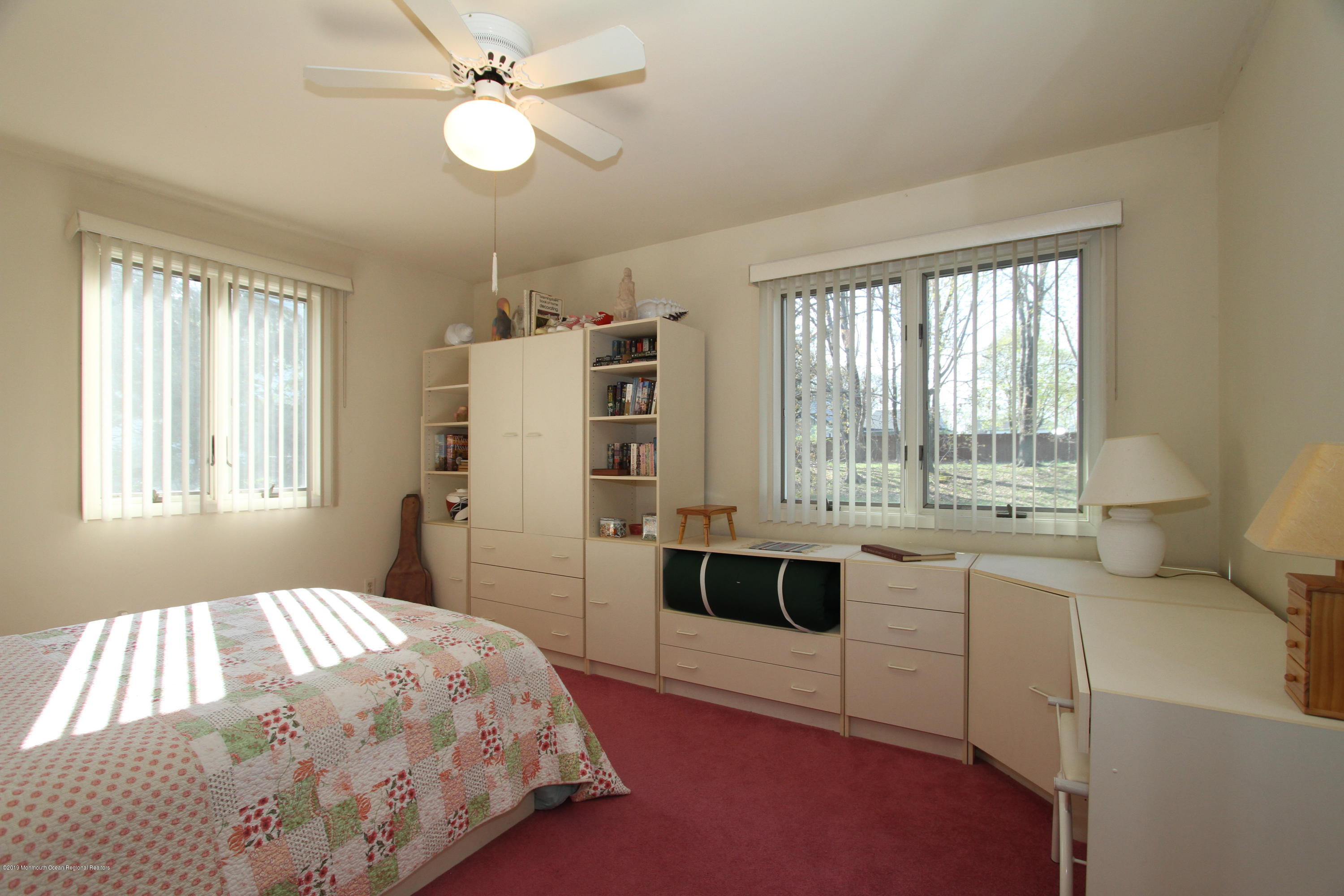 3 Floyd Wyckoff Road Morganville, NJ 07751 - Photo 21 of 28 a spacious bedroom with a bed and a large window