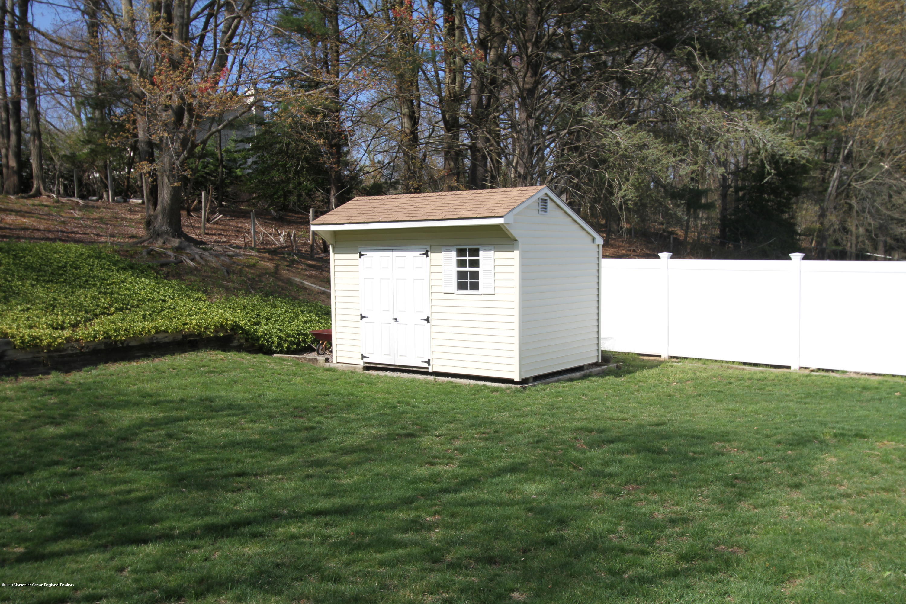 3 Floyd Wyckoff Road Morganville, NJ 07751 - Photo 26 of 28 a view of a house with a yard