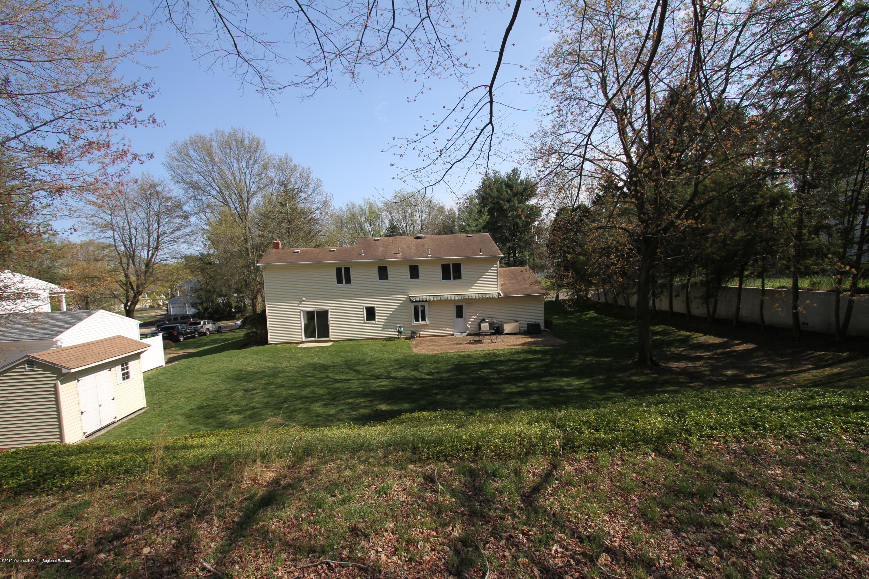 3 Floyd Wyckoff Road Morganville, NJ 07751 - Photo 27 of 28 a view of a house with a yard