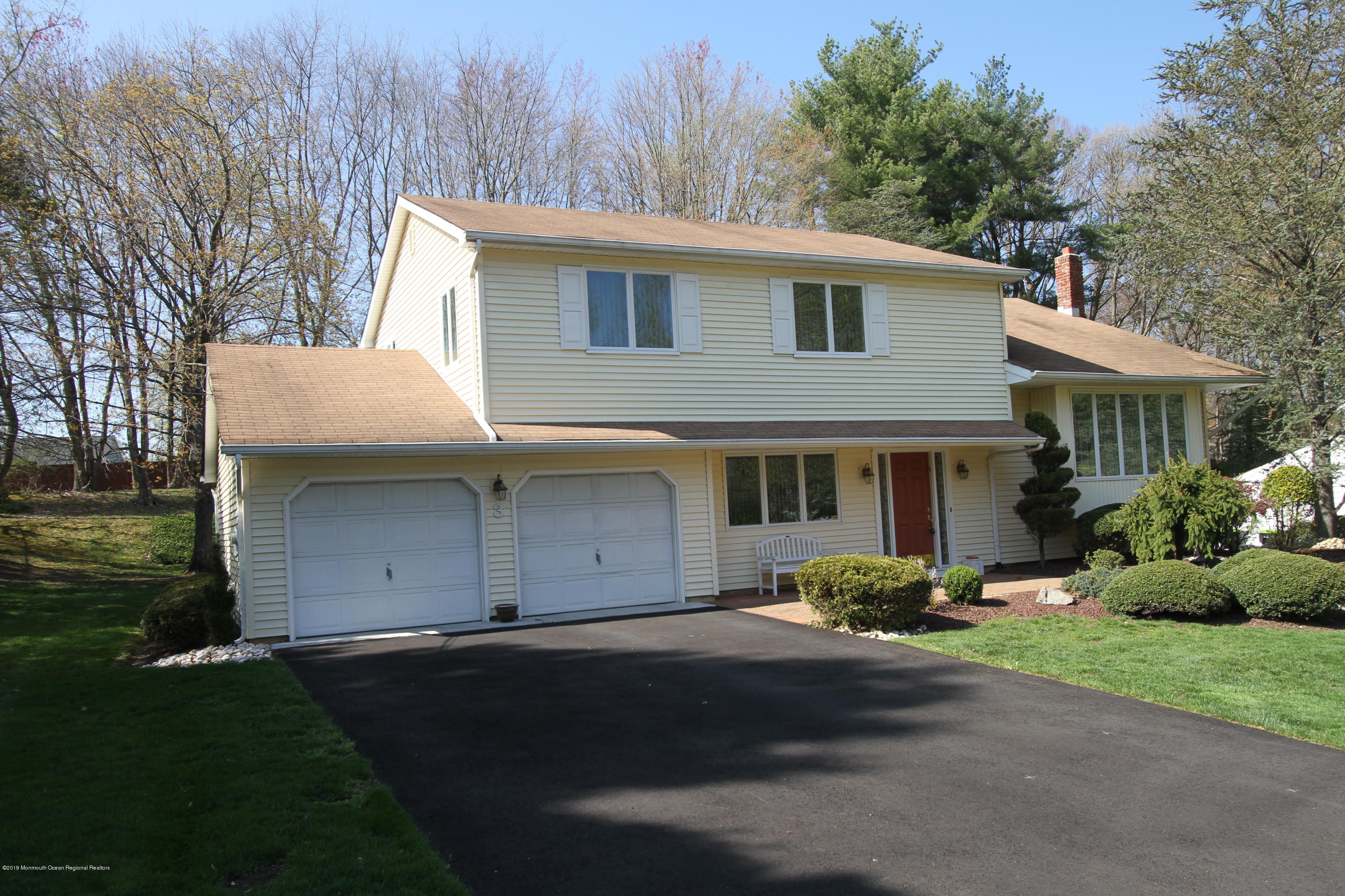3 Floyd Wyckoff Road Morganville, NJ 07751 - Photo 28 of 28 a front view of a house with garden