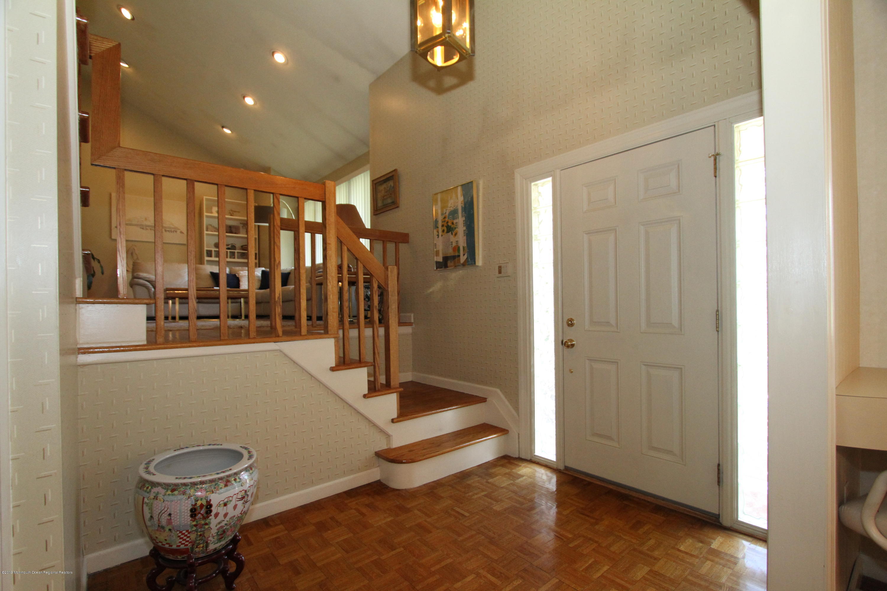 3 Floyd Wyckoff Road Morganville, NJ 07751 - Photo 4 of 28 a view of a hallway with staircase