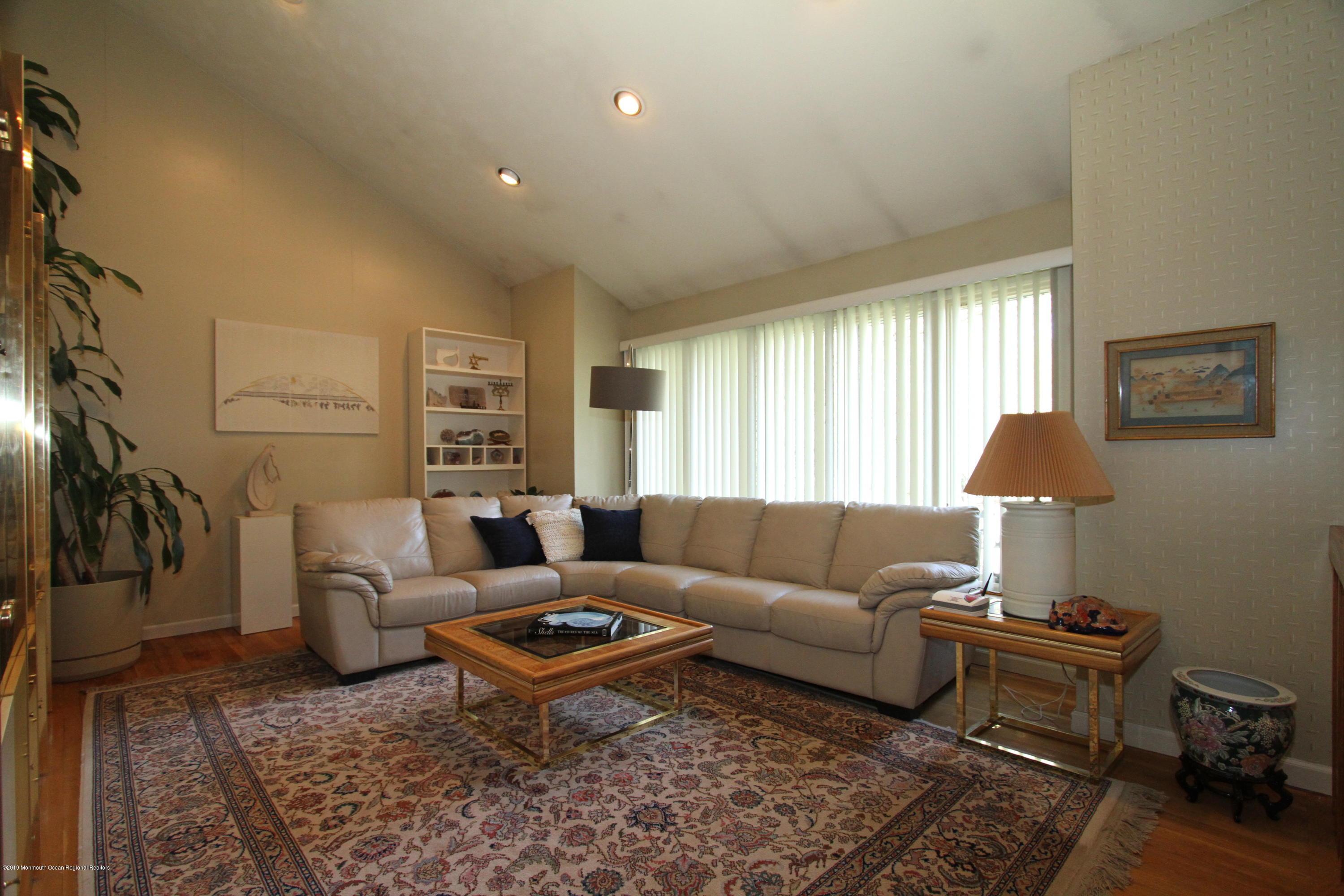 3 Floyd Wyckoff Road Morganville, NJ 07751 - Photo 5 of 28 a living room with furniture and a window
