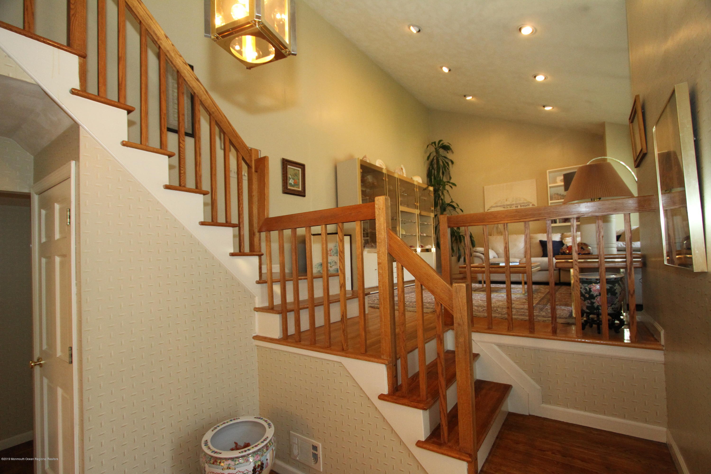 3 Floyd Wyckoff Road Morganville, NJ 07751 - Photo 7 of 28 a view of entryway and hall with wooden floor