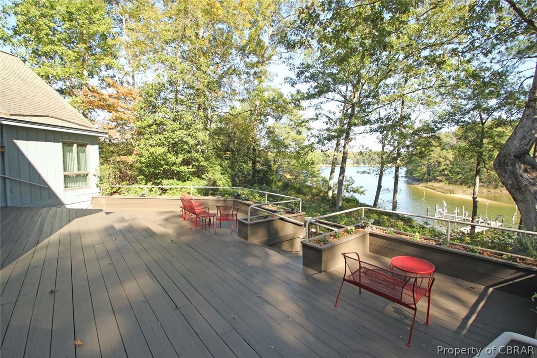 508 Rio Vista Weems, VA 22576 - Photo 4 of 50 Huge Deck overlooking the waterfront with access from the Living Room, new kitchen, original master bedroom & dining room. Plus wraps around entire house to the attached guest apartment.