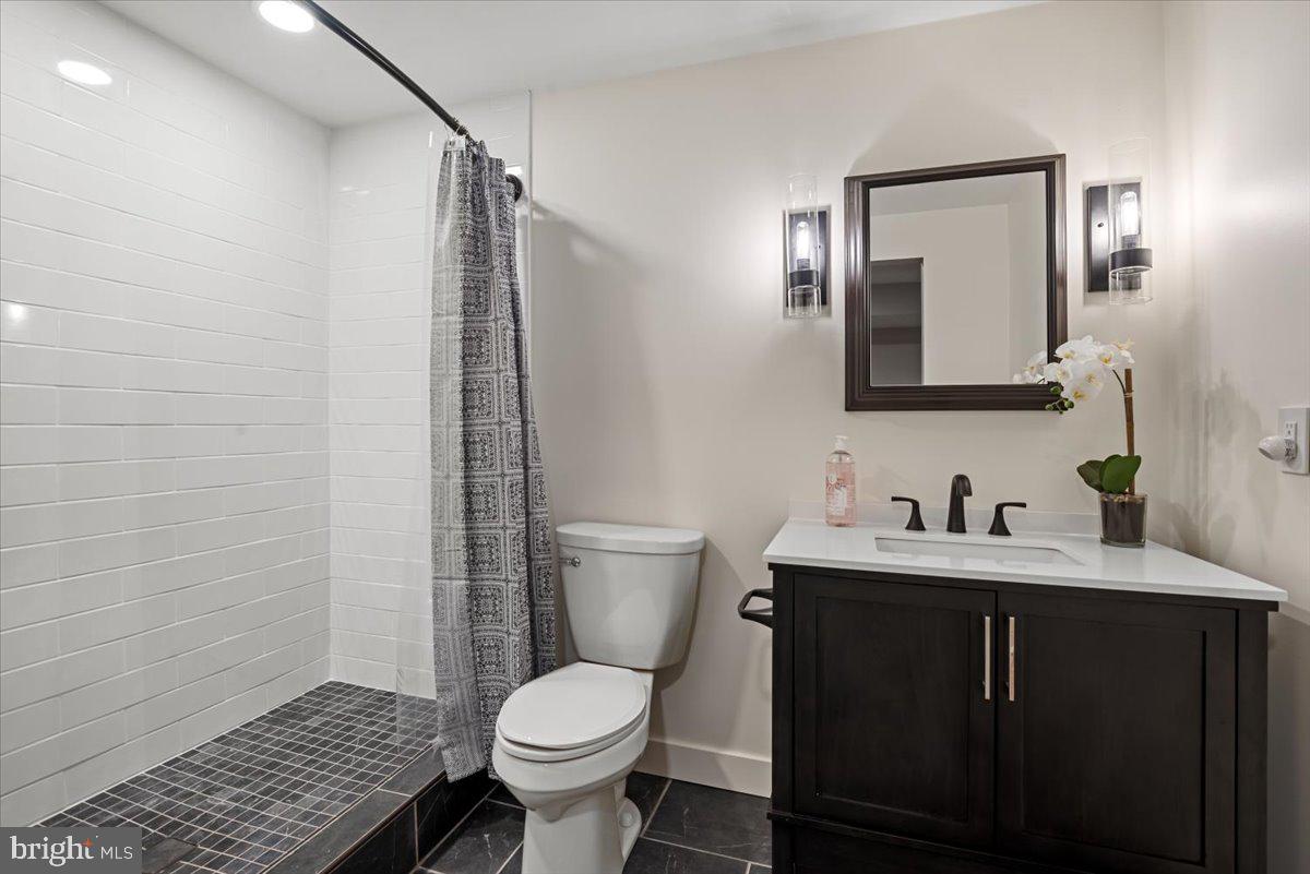 584 Pine Ridge Drive Front Royal, VA 22630 - Photo 29 of 36 NEW Modern sconces, Vanity and subway tile shower