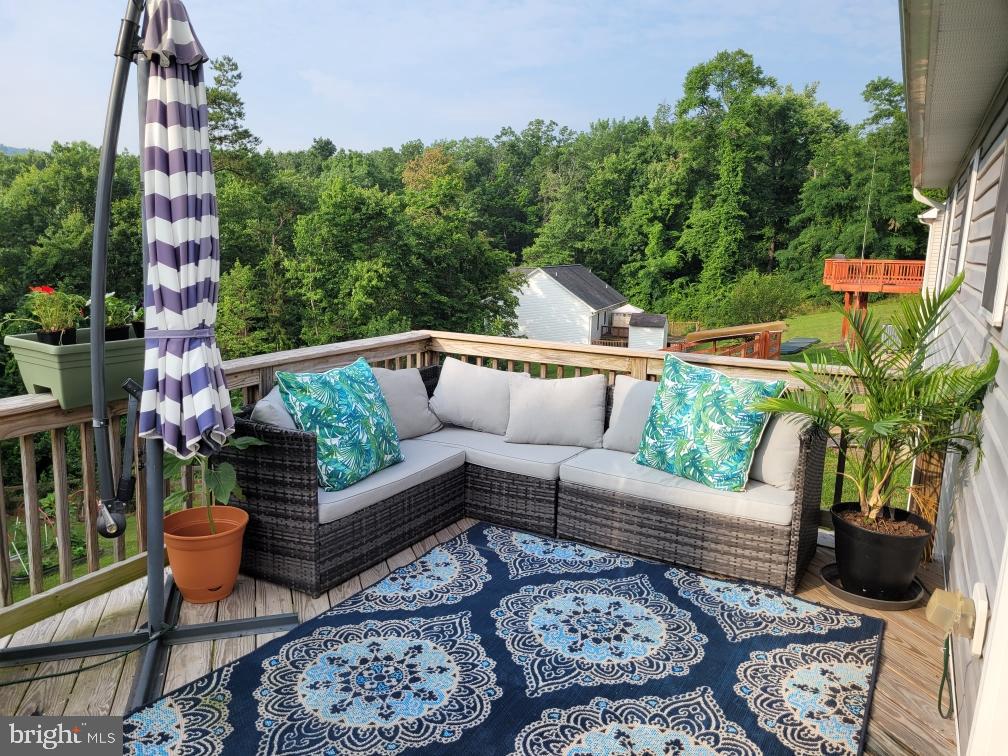584 Pine Ridge Drive Front Royal, VA 22630 - Photo 6 of 36 Outdoor living area on back deck.