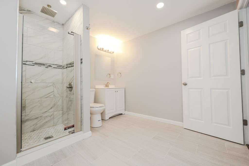 158 Fitchburg Road Townsend, MA 01469 - Photo 17 of 22 a bathroom with a shower and a toilet
