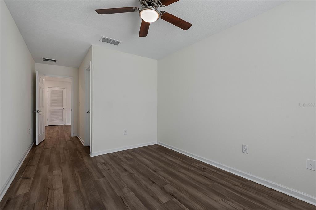 20 Willow Place Palm Coast, FL 32164 - Photo 36 of 61 a view of empty room with wooden floor
