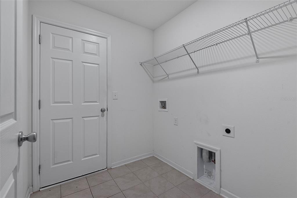 20 Willow Place Palm Coast, FL 32164 - Photo 38 of 61 a view of a livingroom with an empty space