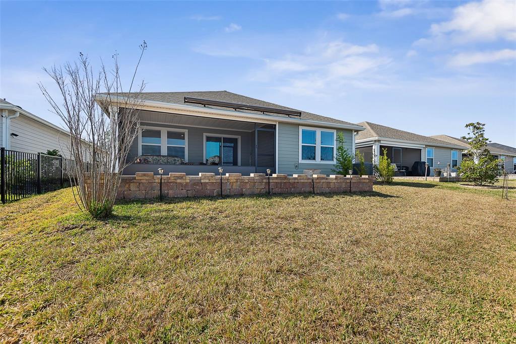 20 Willow Place Palm Coast, FL 32164 - Photo 46 of 61 a front view of a house with a yard