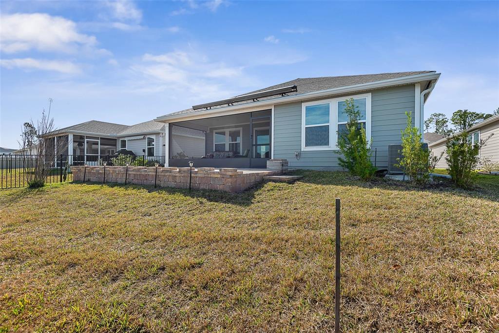 20 Willow Place Palm Coast, FL 32164 - Photo 47 of 61 a front view of a house with garden