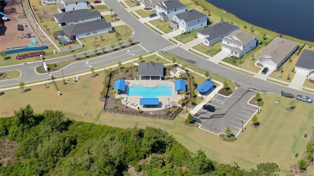 20 Willow Place Palm Coast, FL 32164 - Photo 55 of 61 an aerial view of a house with a yard and lake view