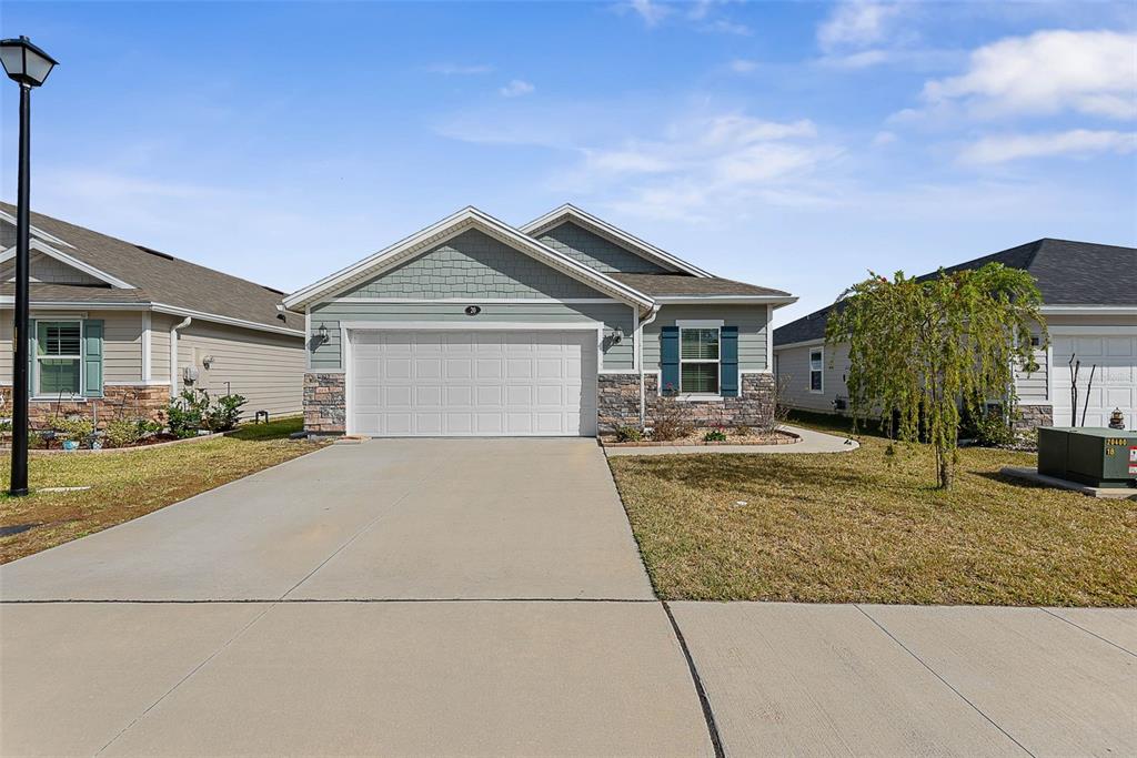 20 Willow Place Palm Coast, FL 32164 - Photo 59 of 61 a front view of a house with garden