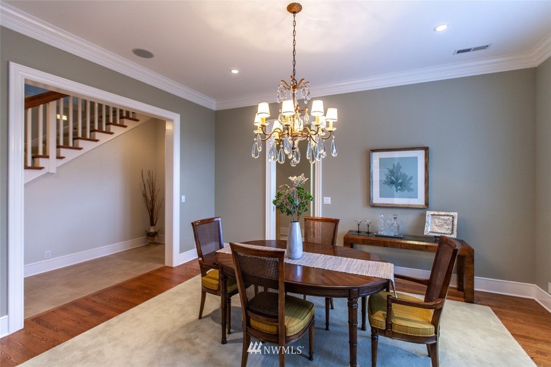 1334 Chuckanut Crest Drive Bellingham, WA 98229 - Photo 13 of 40 a view of a dining room with furniture and chandelier