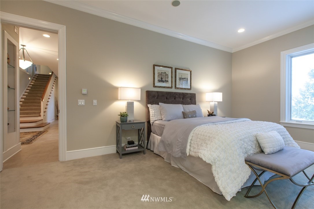 1334 Chuckanut Crest Drive Bellingham, WA 98229 - Photo 22 of 40 a bedroom with a bed and a chair