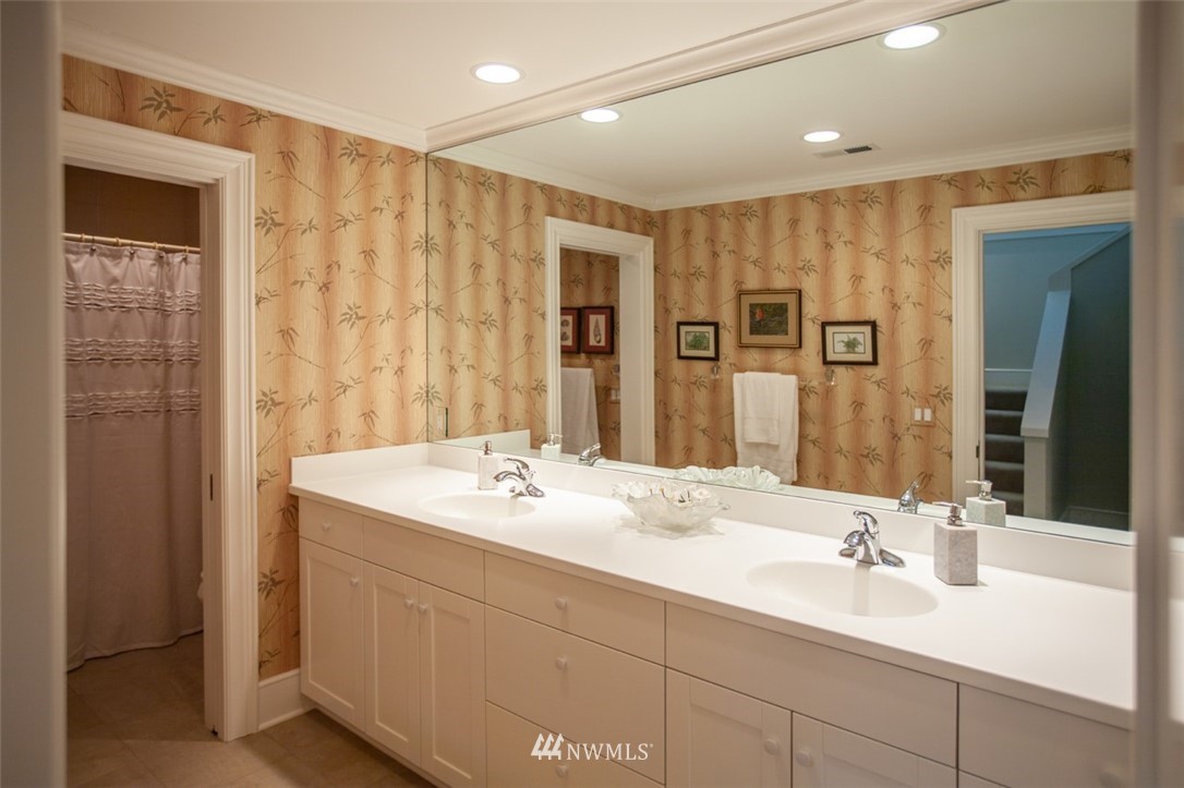 1334 Chuckanut Crest Drive Bellingham, WA 98229 - Photo 37 of 40 a bathroom with double vanity sinks double vanity and a shower