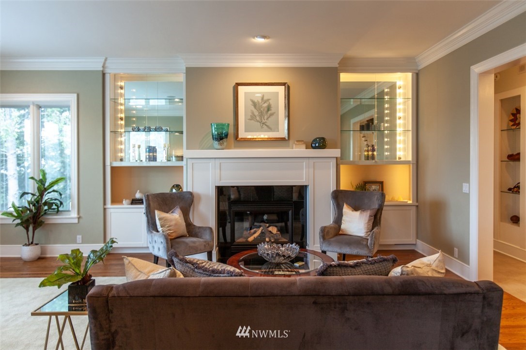 1334 Chuckanut Crest Drive Bellingham, WA 98229 - Photo 9 of 40 a living room with furniture and a fireplace