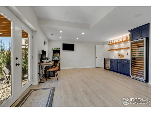 a living room with a couch and a window