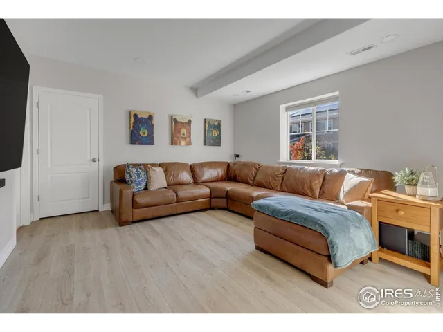 a view of a house with backyard and porch